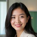 Professional photo of Aisha Rahman, a financial coach specializing in debt management and retirement planning.